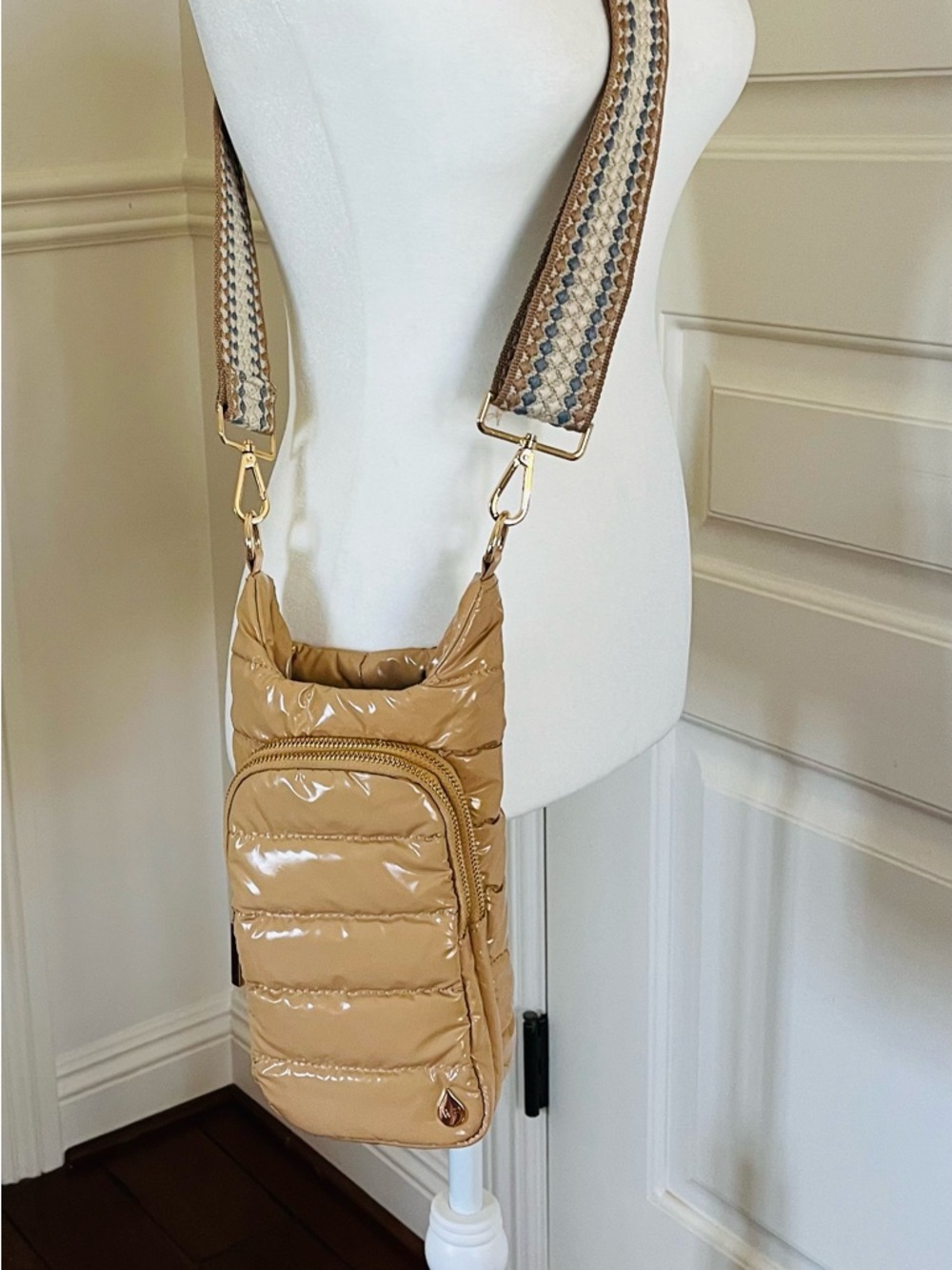 Glossy Beige Quilted Crossbody bag with Patterned Strap, bottle holder bag